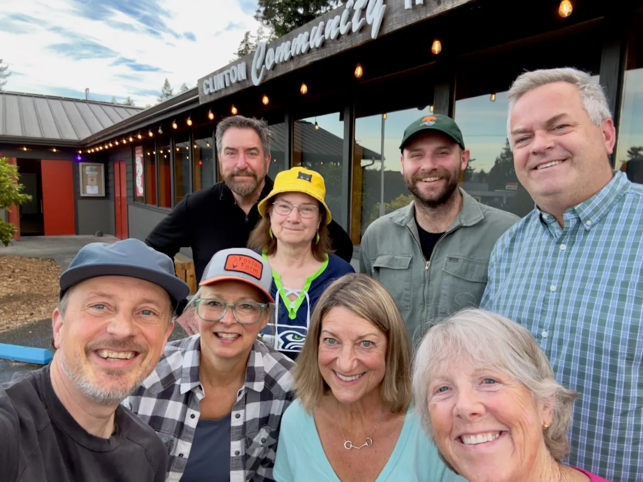 The 2026 Clinton Community Hall board and Hall Manager in front of the Hall