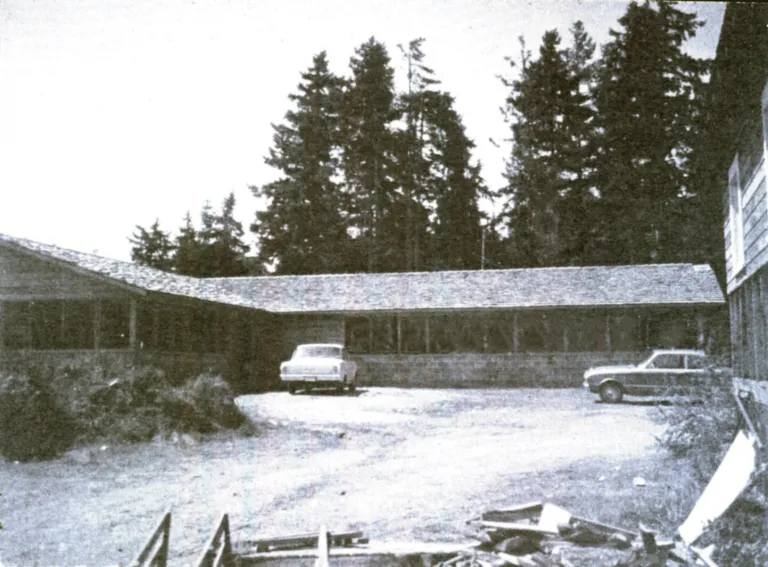 The original and current halls standing side by side on the same site